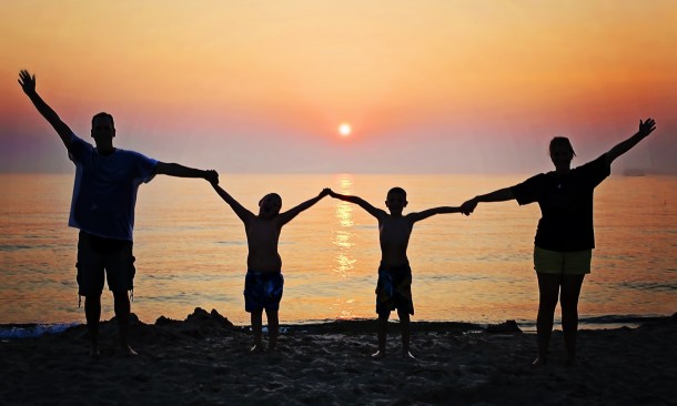 Family Silhouette Holding Hands